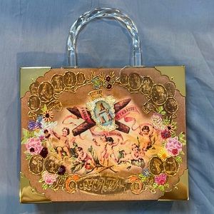 Vintage and funky cigar box purse.
